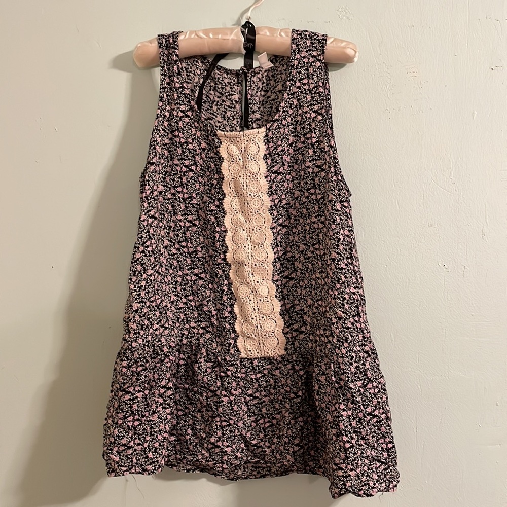 Black floral sleeveless blouse